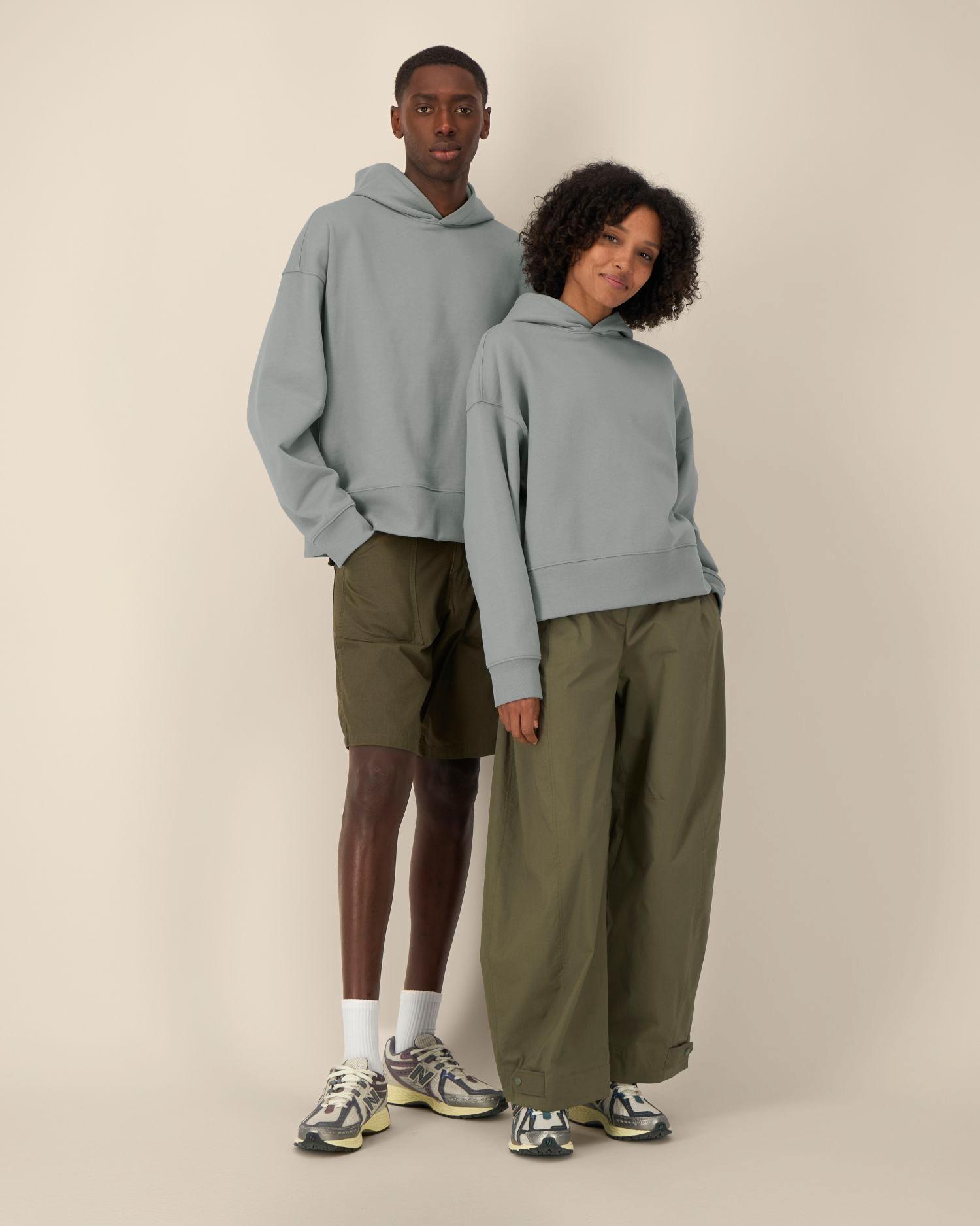 Le sweat à capuche unisexe coupe Boxy en coton recyclé