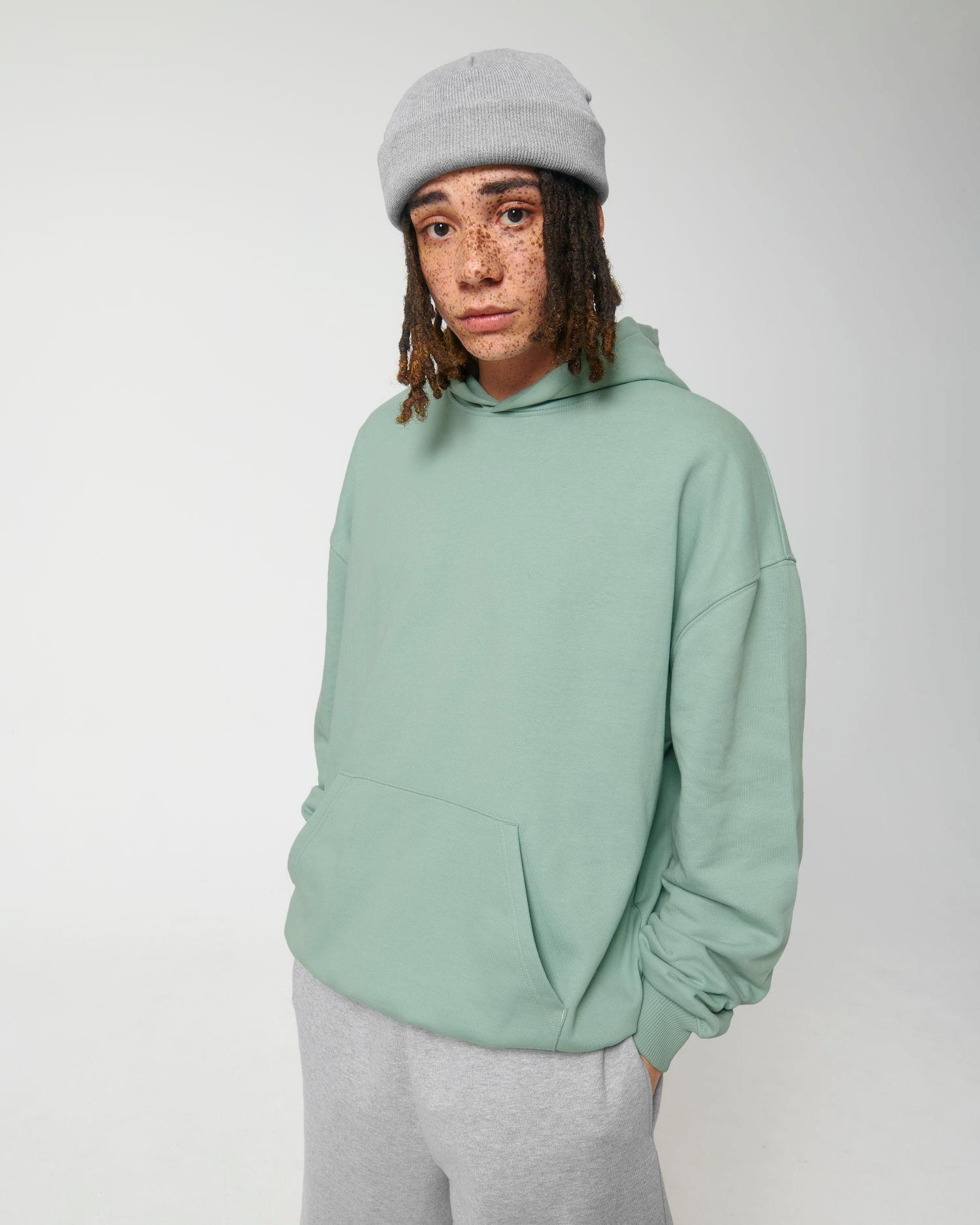 Le sweat à capuche unisexe coupe Boxy au toucher sec